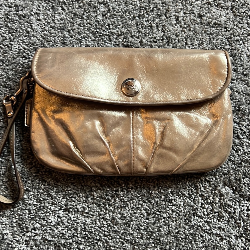 Coach, sliver and purple wristlet